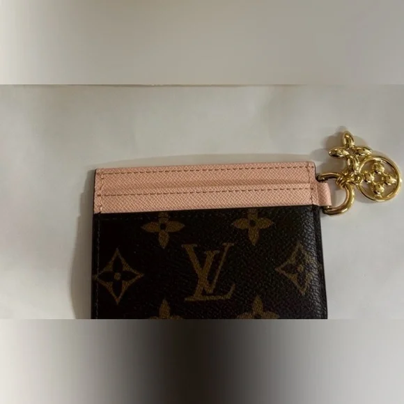Like new Louis Vuitton Monogram Brown and Pink Key Holder LV